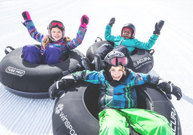 Go tubing at the WinSport Tube Park