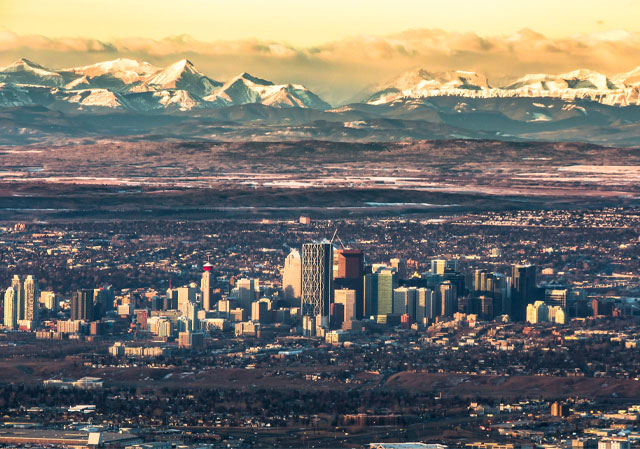 Calgary skyline with mountains 