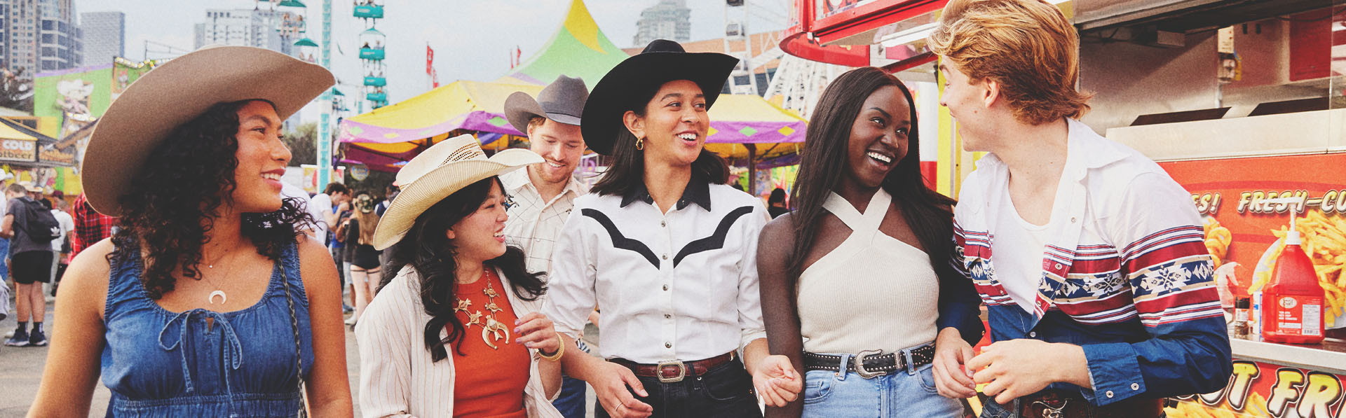 group of friends exploring the Calgary Stampede grounds