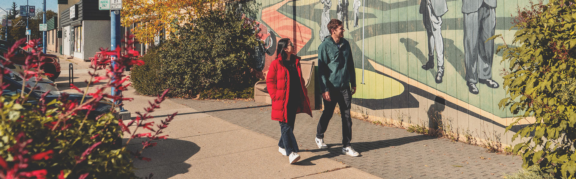 two people are walking in Bowness area