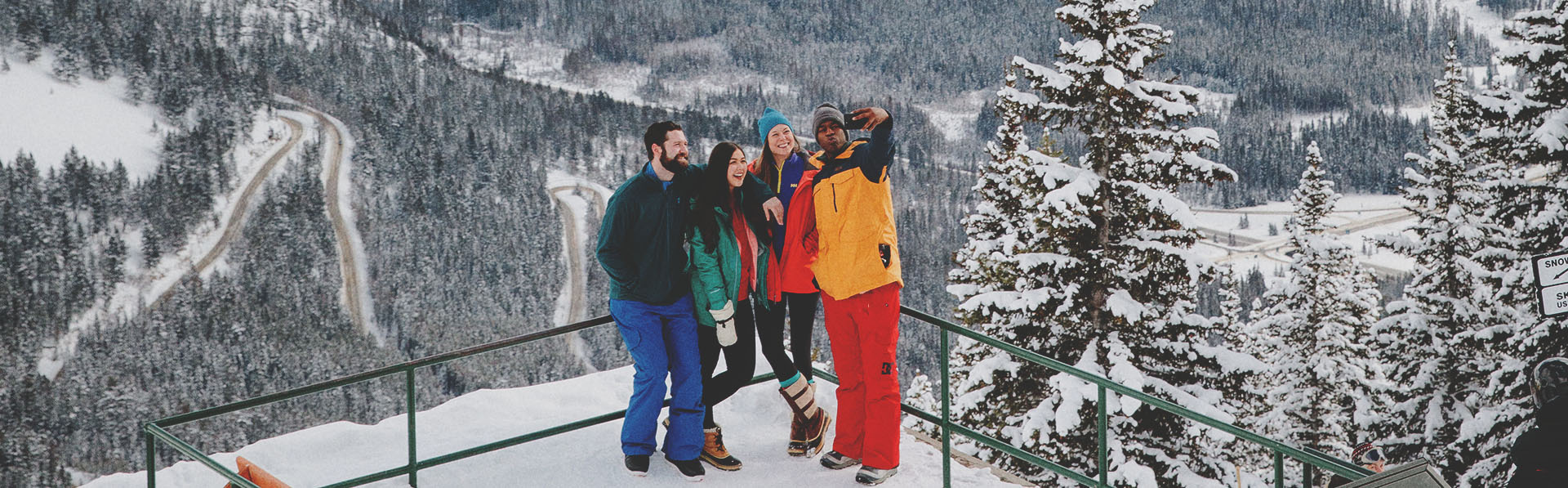 a group of friends taking a selfie in Banff National Park