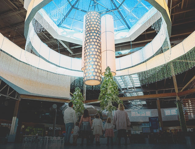 A family at CrossIron Mills shopping mall in calgary