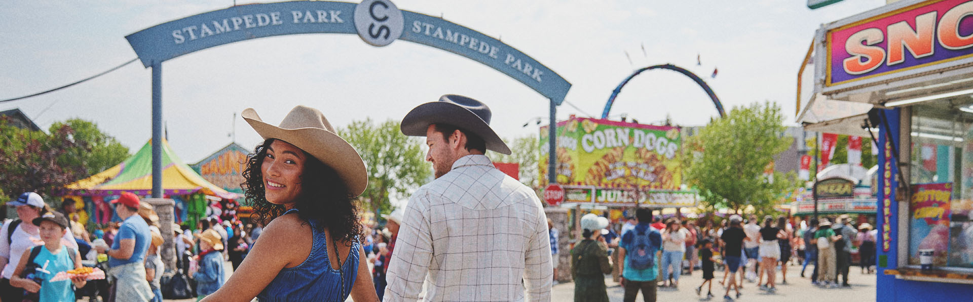 a couple enjoying Calgary Stampede