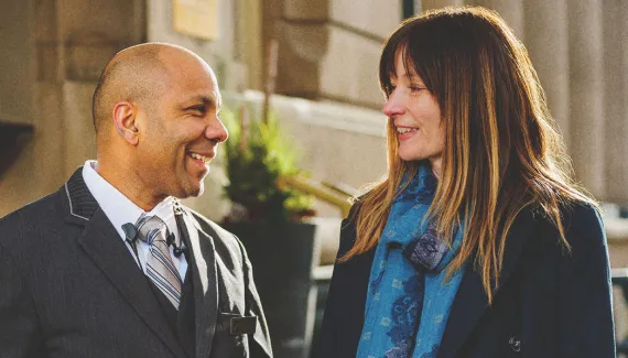 Concierge helping a guest outside the Fairmont Palliser