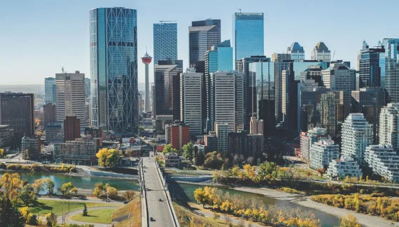 aerial of the Calgary skyline looking down Centre street during late summer