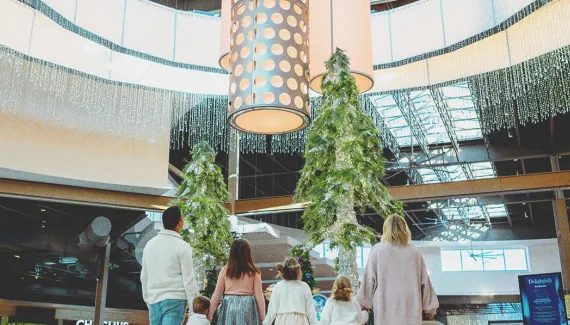 A family at CrossIron Mills shopping mall in calgary