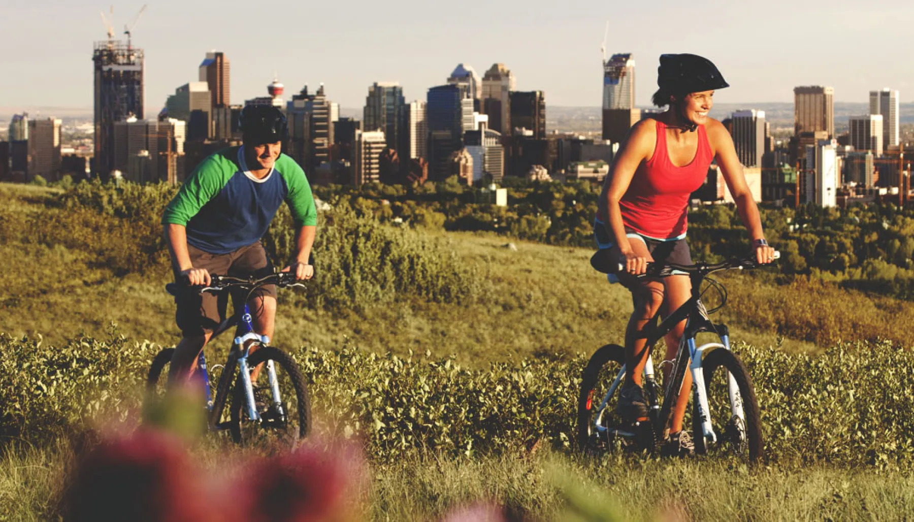 Biking on Nose Hill with the Calgary skyline in the background