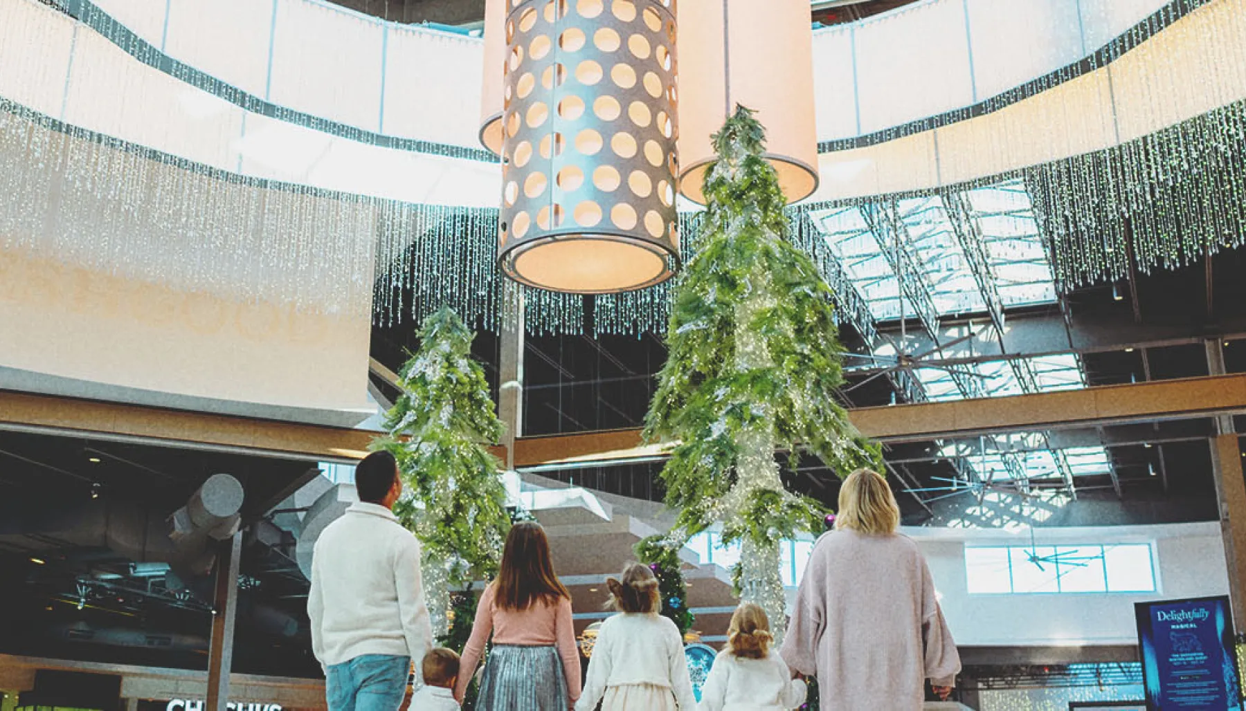 A family at CrossIron Mills shopping mall in calgary