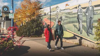 two people are walking in Bowness area