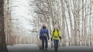 two girls hiking in Fish Creek Park Calgary