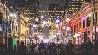 people walking along Stephen Avenue during winter