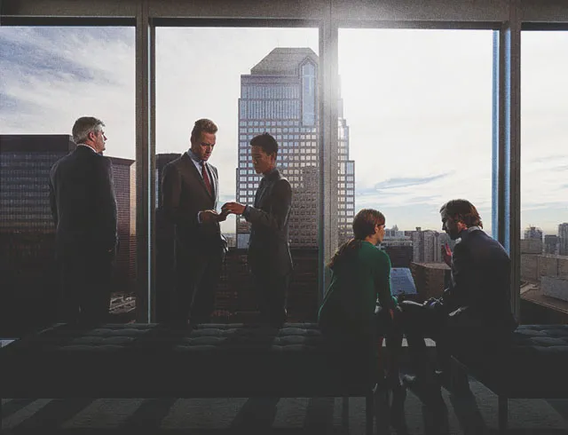 Business executives meet in a downtown Calgary skyrise