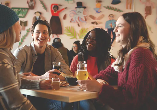 group of friends sampling beer at Dandy Brewing