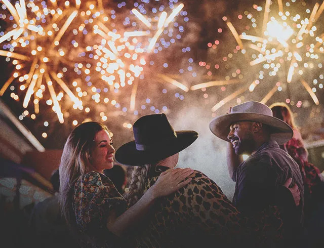 friends watching the Fireworks Extravaganza at Calgary Stampede