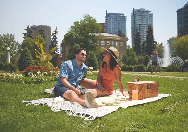 couple enjoying a picnic in Central Memorial Park during summer