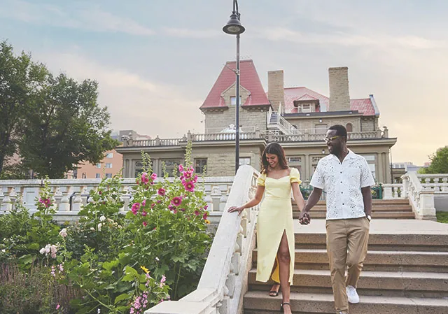 couple explores the Beaulieu Gardens outside Lougheed House