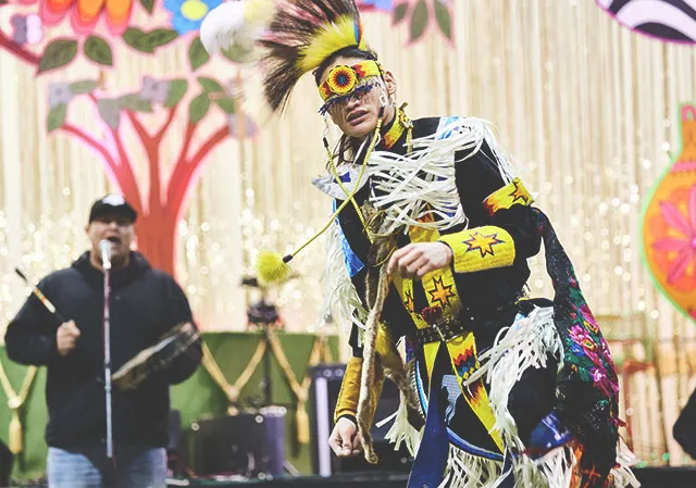 An Indigenous dancer performs during an event at the BMO Centre