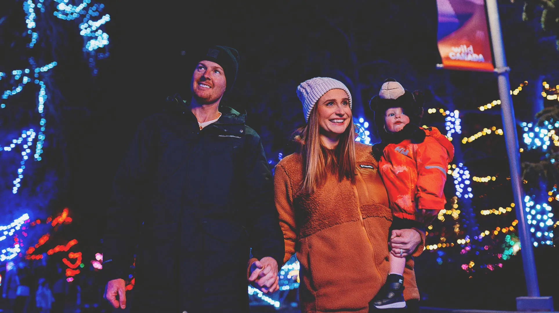 a family enjoying ZOOLIGHTS at Calgary zoo